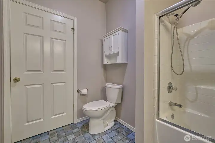 Guest bath with additional storage.