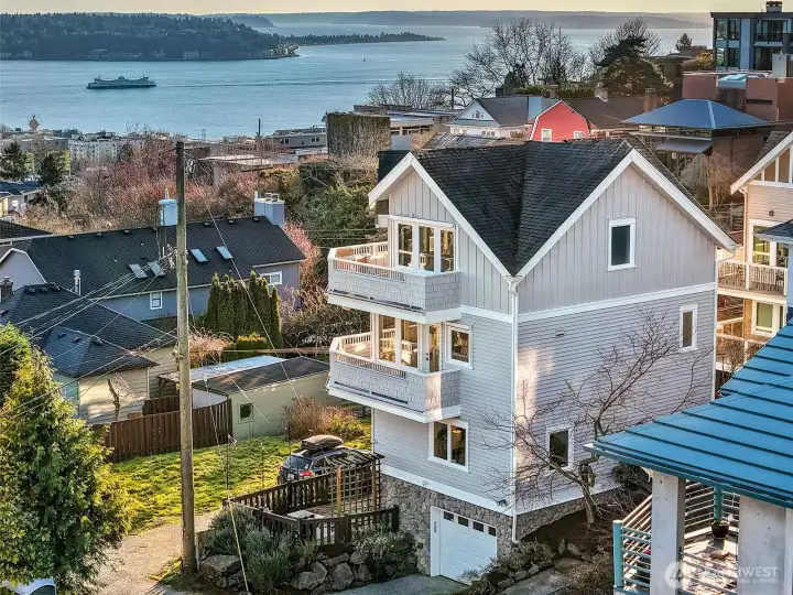 Prime Seattle location with wonderful outdoor spaces, including decks from the living and primary suite to enjoy the views.