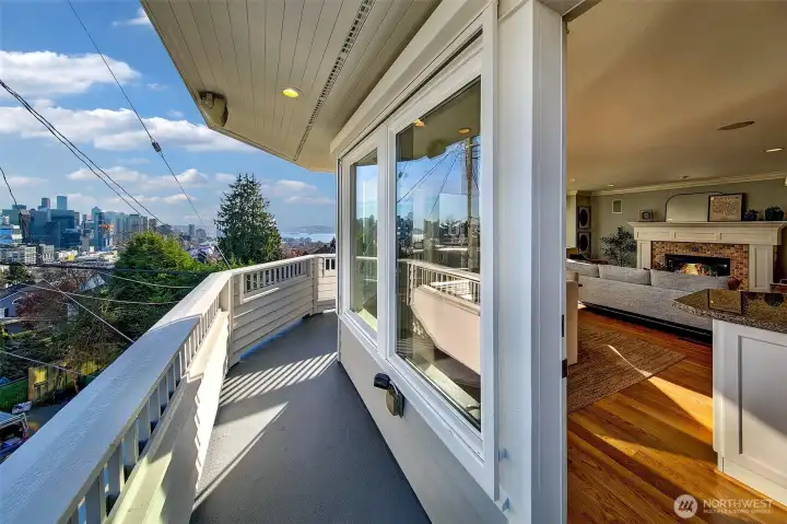 Great outdoor spaces include decks from living and primary suite, a low maintenance front yard and a ground level sunshine terrace.