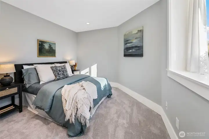 Lowest level bedroom also makes a great TV room or office hideaway.