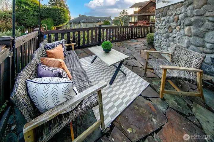 Great outdoor spaces include decks from living and primary suite, a low maintenance front yard and a ground level sunshine terrace.