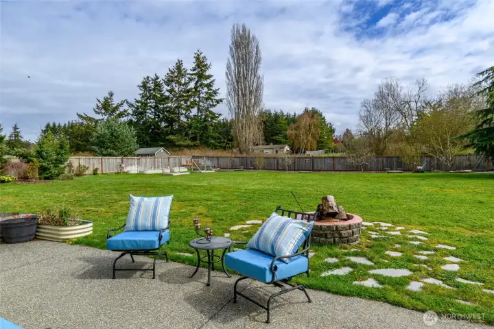 Level, Fully Fenced Backyard.