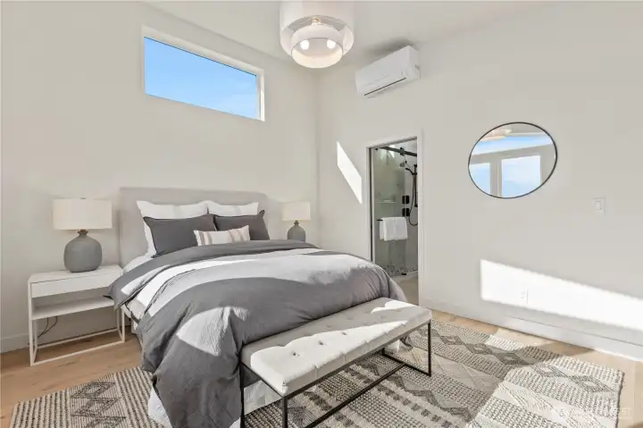 Large primary with view of Ocean and vaulted ceilings