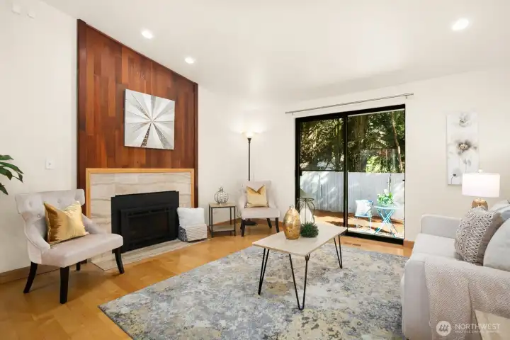 Upstairs with vaulted ceilings, gas fireplace and access to your fenced yard