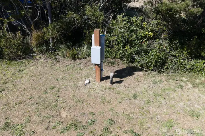 Property is cleared, driveway completed, instaled water, sewer and power (320 amp service).