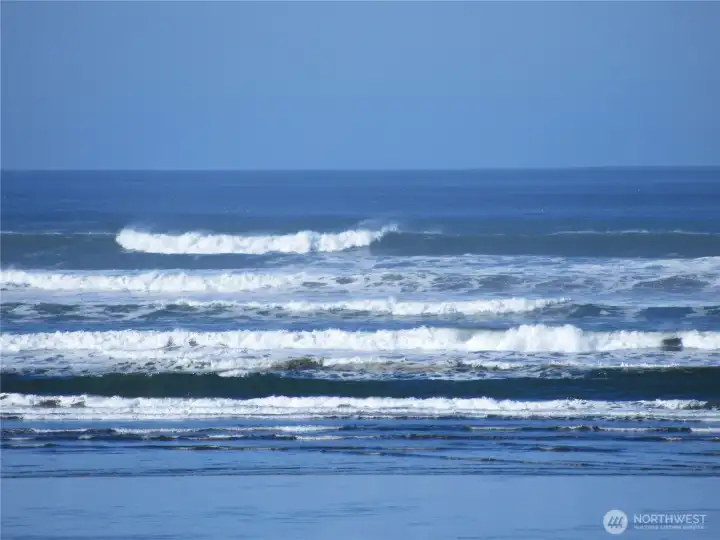 You will be able to hear the rythmic sounds of the waves meeting the shore line from your own property!