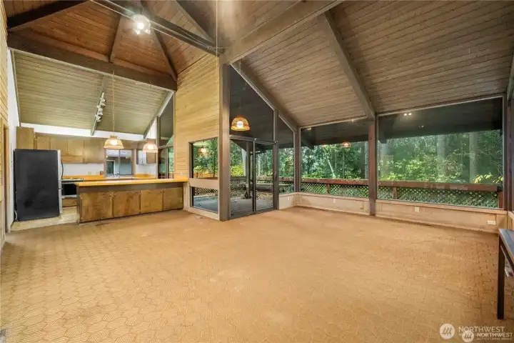 Vaulted ceiling and windows say it all, could not get more peaceful.