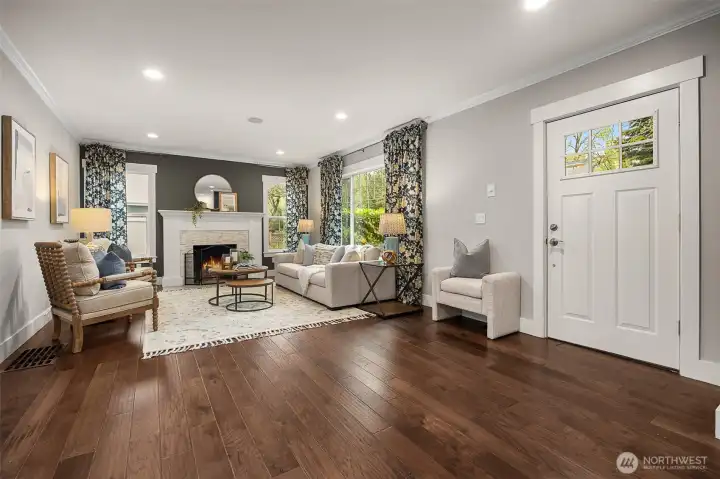 Designed for both comfort and elegance, this living room shines with a beautiful fireplace that creates an inviting, cozy atmosphere.
