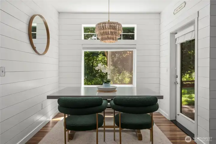 Dining area fits large table and looks out to greenbelt Dining area fits large table and looks out to greenbelt