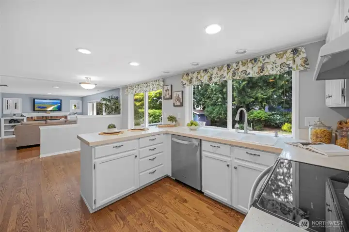 Kitchen with eating space and door to patio.