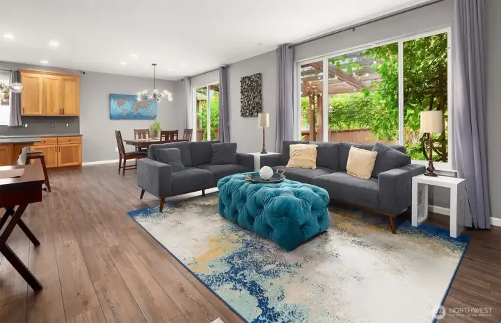Open floor plan with natural lighting flowing throughout the main level. Open floor plan with natural lighting flowing throughout the main level.
