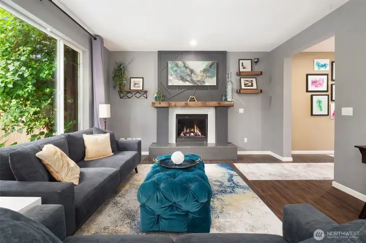 Family Room features luxury vinyl plank flooring, fireplace and beautiful details. Family Room features luxury vinyl plank flooring, fireplace and beautiful details.
