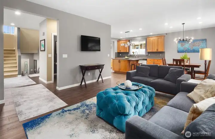 Open and spacious floor plan with view of Family Room, Kitchen and stairwell. This home has been extensively update. Open and spacious floor plan with view of Family Room, Kitchen and stairwell. This home has been extensively update.