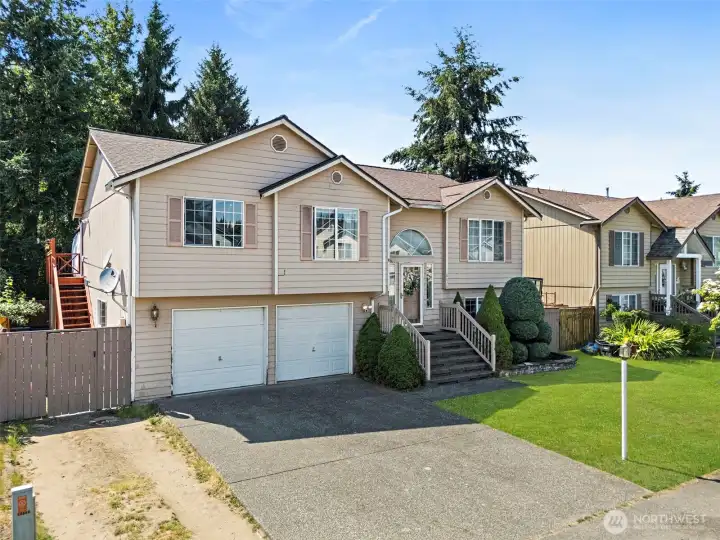 Front of home with parking to left!