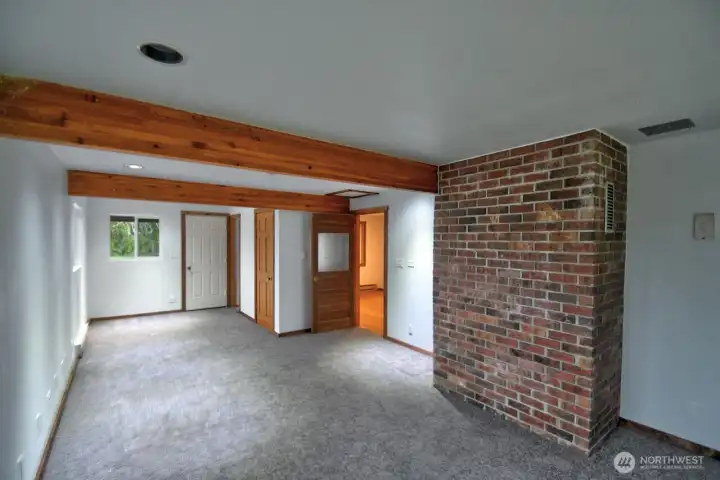 Den/office space with half bath just off the dining room. It has its own entrance.