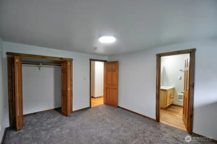 Primary bedroom with  updated 3/4 bath