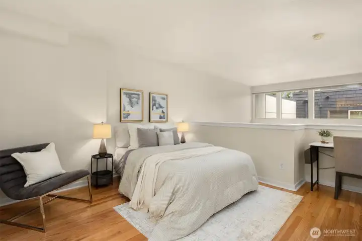 Lofted bedroom with space for a home office Lofted bedroom with space for a home office