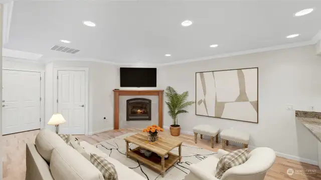 Family Room with Gas Fireplace.   Laundry and Guest Bath just adjacent