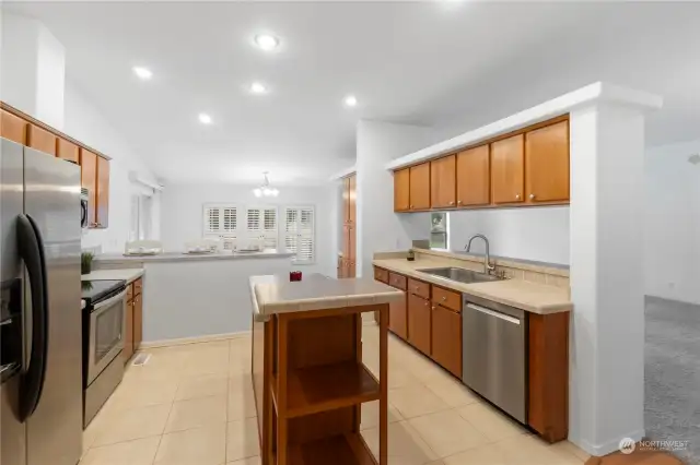 The kitchen is the hub of the home opening up to the great room just to the right. Never miss a conversation while entertaining guests.