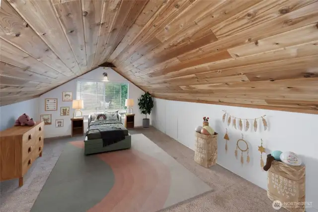 Bonus room/loft area staged as a bedroom