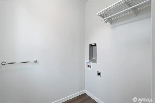 Laundry room (and 1/2 bath) on the main floor.