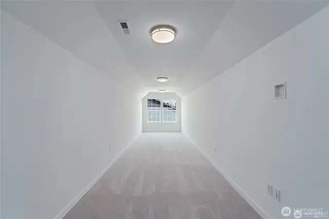 Bonus room over garage with closet (upstairs). Large space could be used as another bedroom, family room, or craft room.