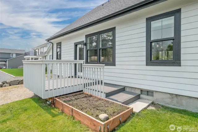 Gutters, raised garden bed and back deck.