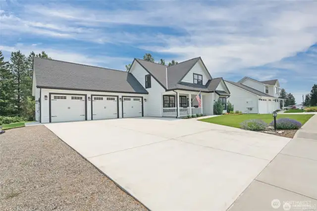 3-car attached garage PLUS outside parking space for several more vehicles.