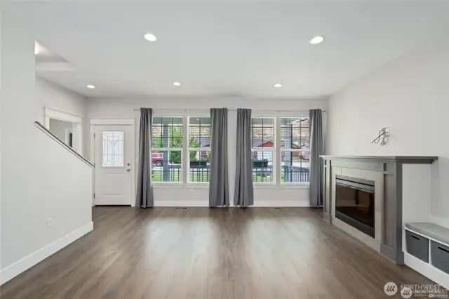 Living room with electric fireplace.