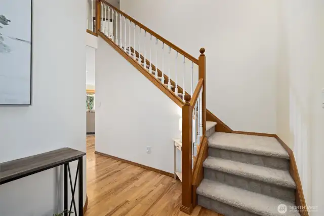 Grand entry to the upstairs walkway that has 4 options for bedrooms & 2 separate bathrooms.