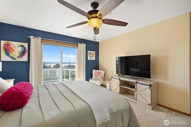 Primary bedroom w/private VIEW deck, 5 piece ensuite & custom walk-in closet.