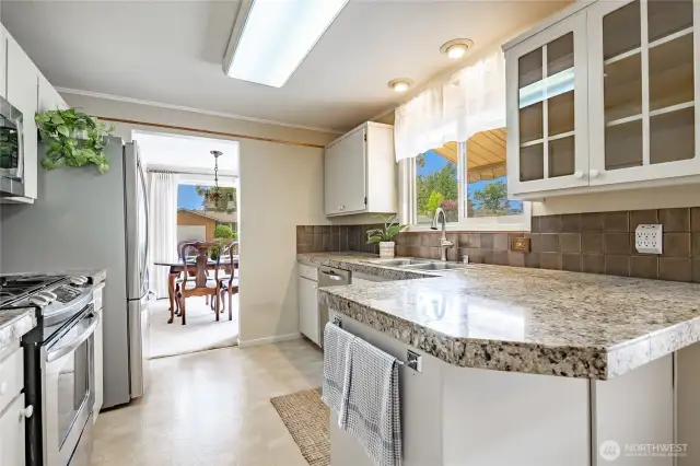 Kitchen opens to dining room