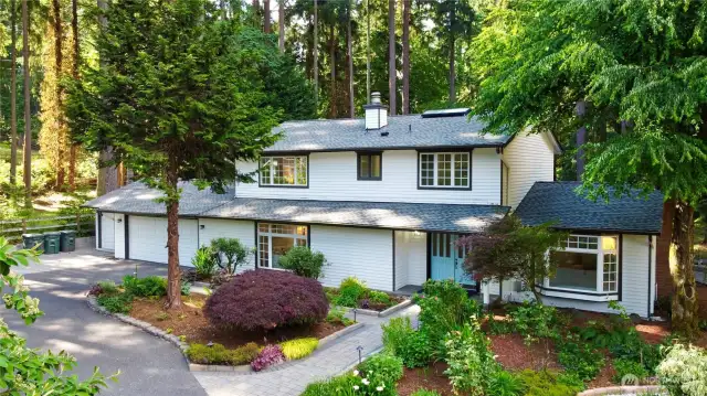 The beautiful south-faced home sites on a lush, landscaped big lot