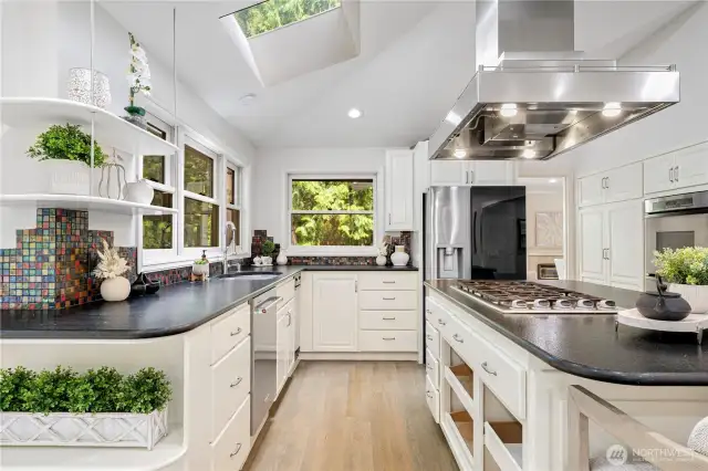 Kitchen has abundant natural light, Showcasing contemporary design and comfortable furnishings