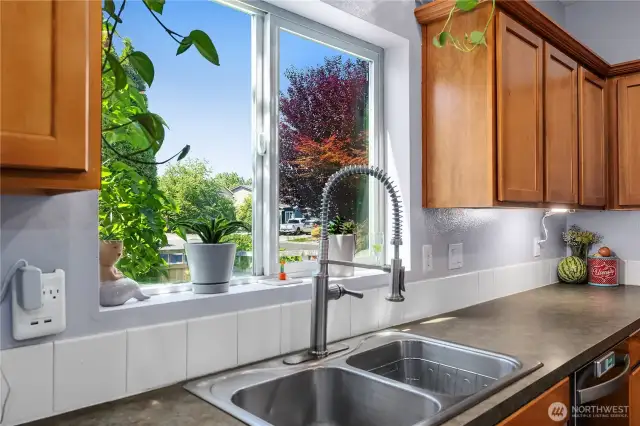 View of beautiful foliage on your spacious corner lot!