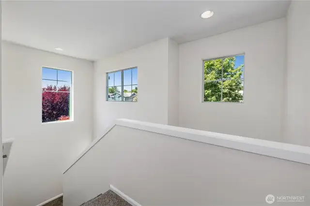 Upstairs stairwell with extra windows.