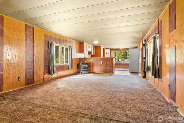 Extremely large living room. At one time half of it was a second bedroom. It could be converted back? Pellet stove included.
