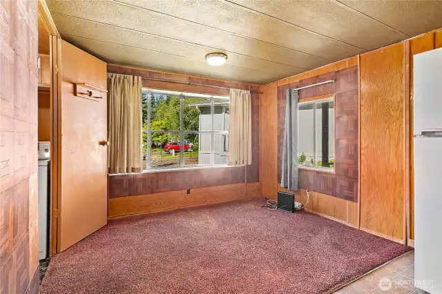 Dining area off of the kitchen. Or office space?
