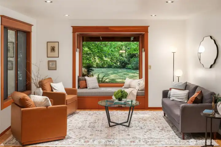 Window seat overlooks the meadow where deer regularly graze.