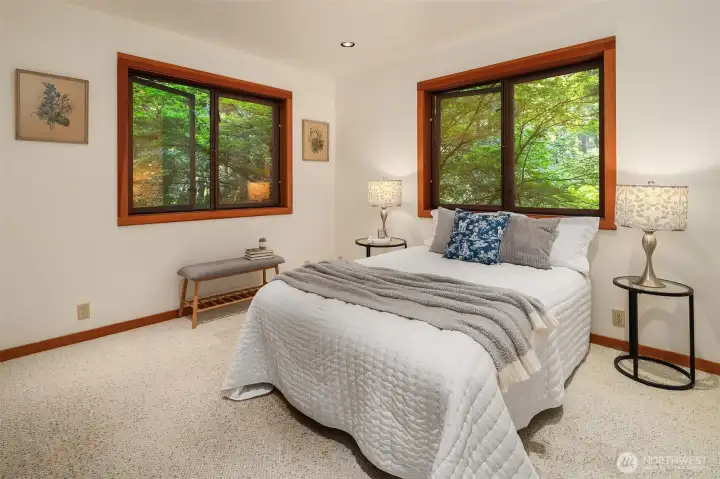 Second bedroom on the second floor with windows to the south and west.