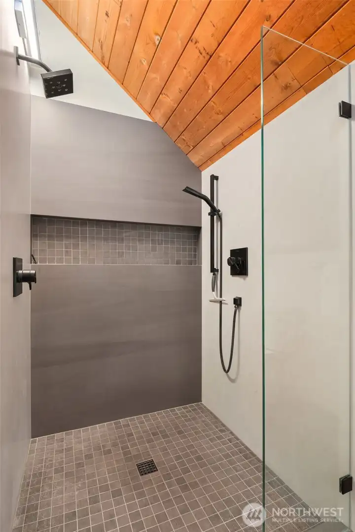 Lovely & generous custom tiled shower in the tree-house suite.