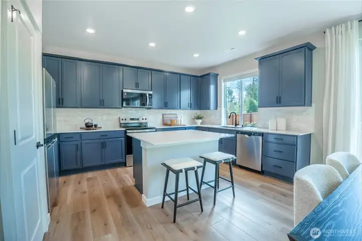 Image of model home of same plan. Colors/finishes may vary.