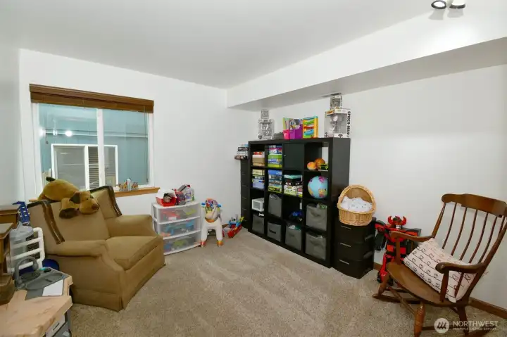 Downstairs bedroom or perhaps a play room?