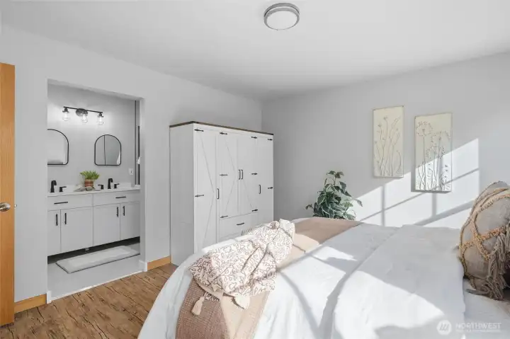 The primary suite is your personal retreat with a spa-inspired ensuite bath featuring a modern tile walk-in shower and dual vanity.