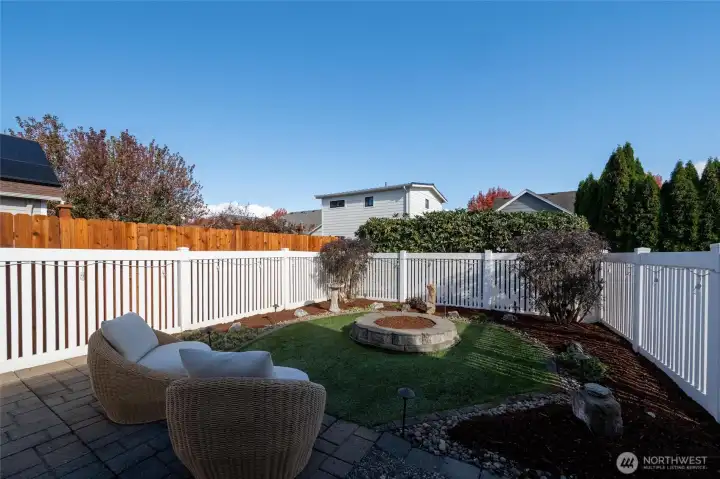 The back yard is built to enjoy the turf grass and privacy.