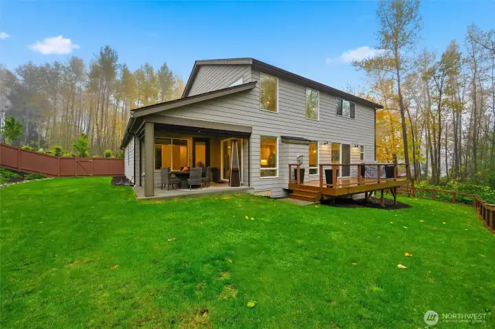 The property extends to the protected wetlands beyond the fence ensuring privacy and serenity.