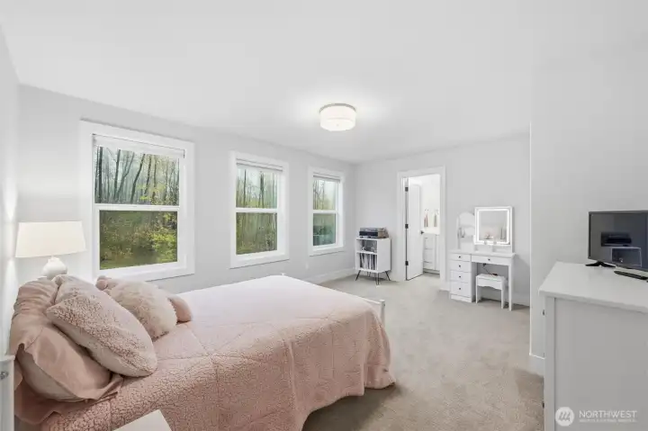 Shown is a full-sized bed, this room could easily accommodate a queen-sized bed.