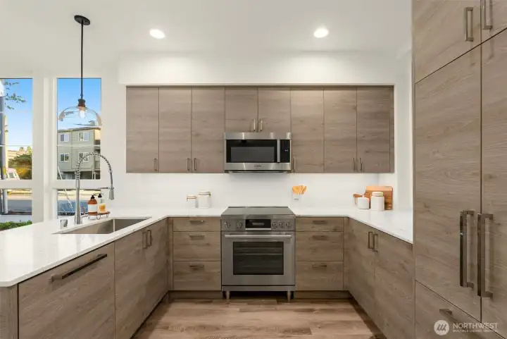 This is the kitchen moment you've been waiting for. With quartz countertops, Bosch appliances, and soft wood tones, it blends chef-grade function with designer flair.