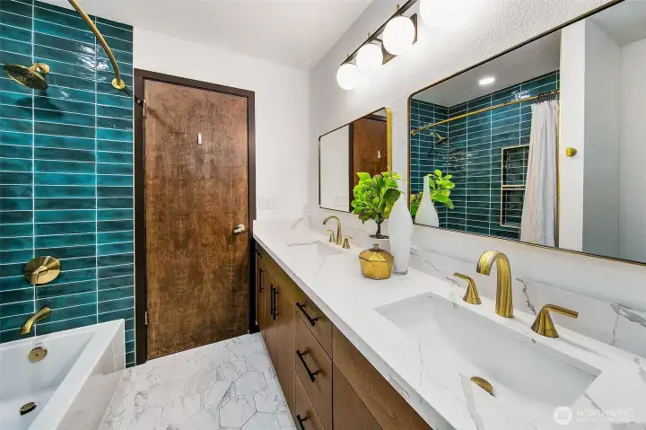 Full bathroom near the bedrooms on the lower level