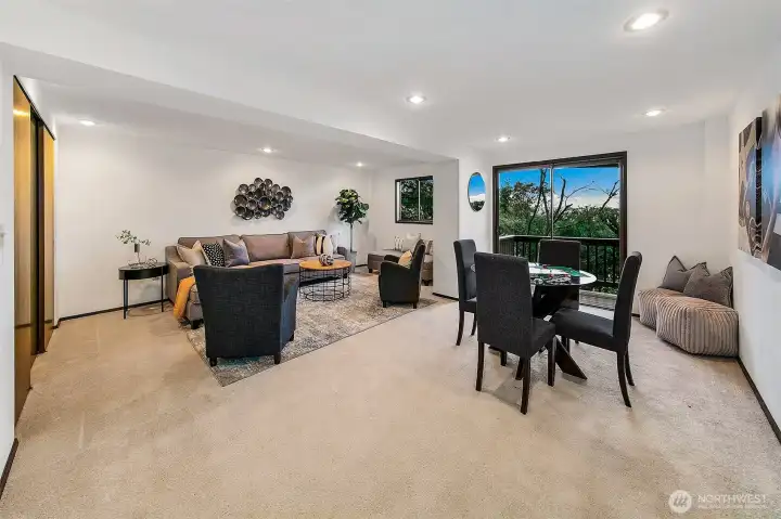 Another view of the lower level rec room or flex space. Access to the lower level deck